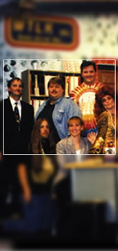 Talk Radio (1998): Some of the cast pose in the studio of shock-show radio station WTLK.