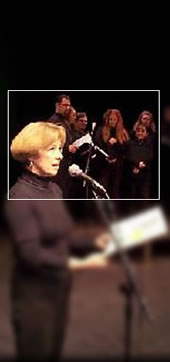 The War of the Worlds (2000): Judie Hanson as Carla Phillips brings grave news of the invasion as Foley Artists look on.
